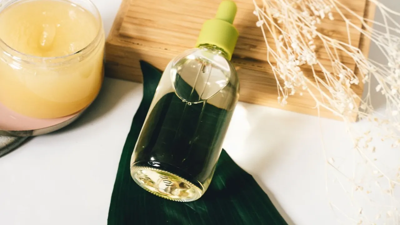 Skincare bottles and jars with botanical accents