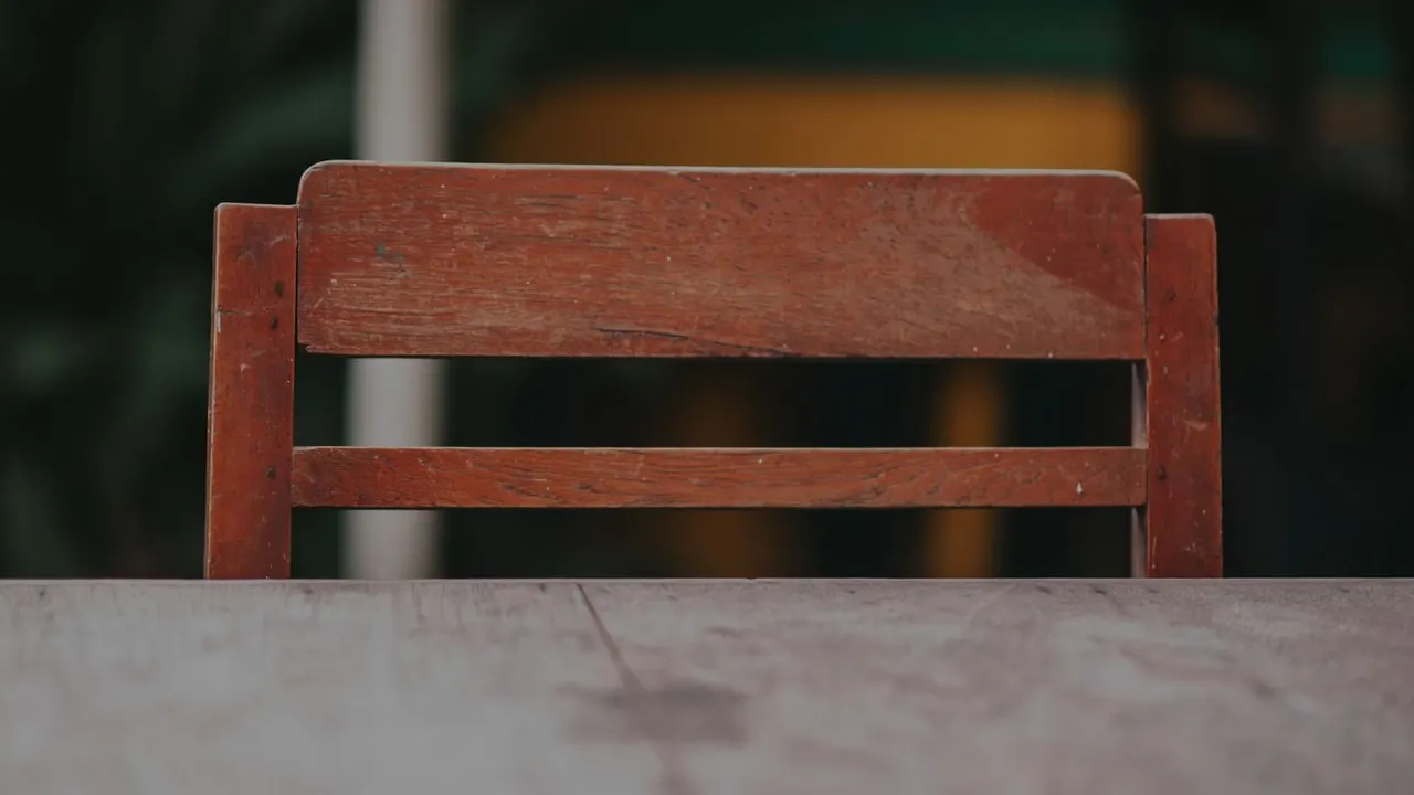 Wooden chair beside a wooden table