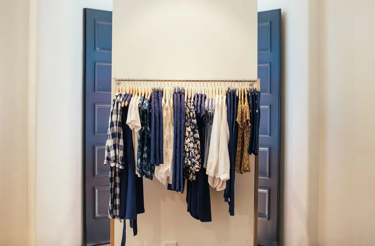 Garments hanging neatly on a clothing rack