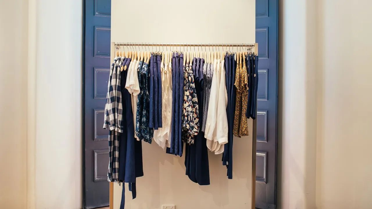 Garments hanging neatly on a clothing rack