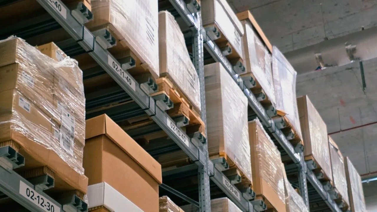 Cardboard boxes organized on warehouse shelving