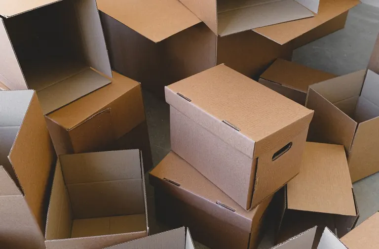 Empty cardboard cartons prepared for packing