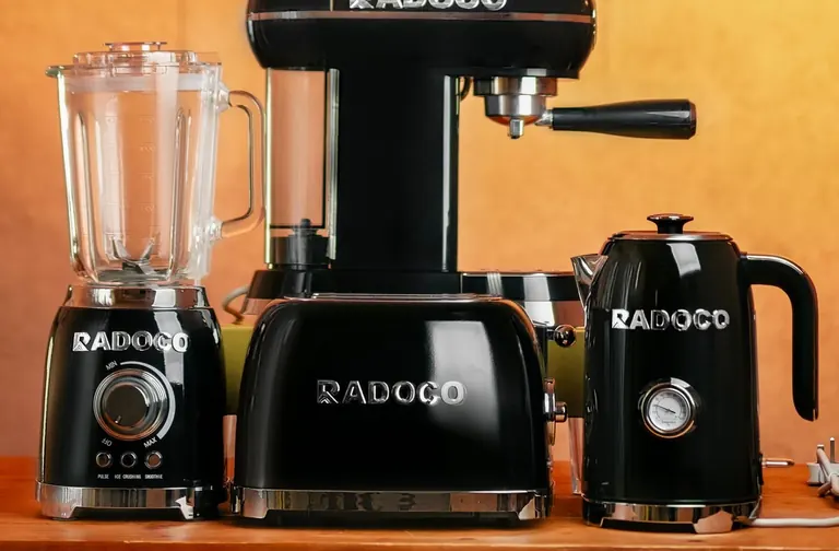 Blender mixer and kettle on a warm background