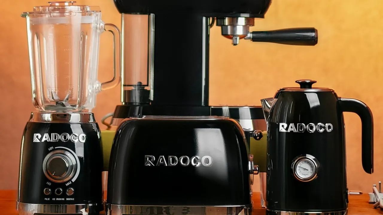 Blender mixer and kettle on a warm background