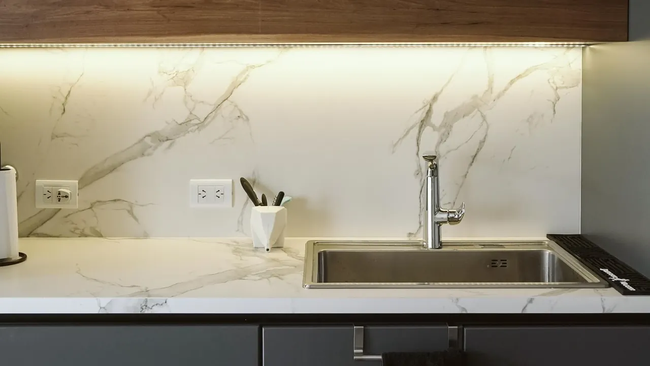 Marble kitchen countertop with a stainless steel sink