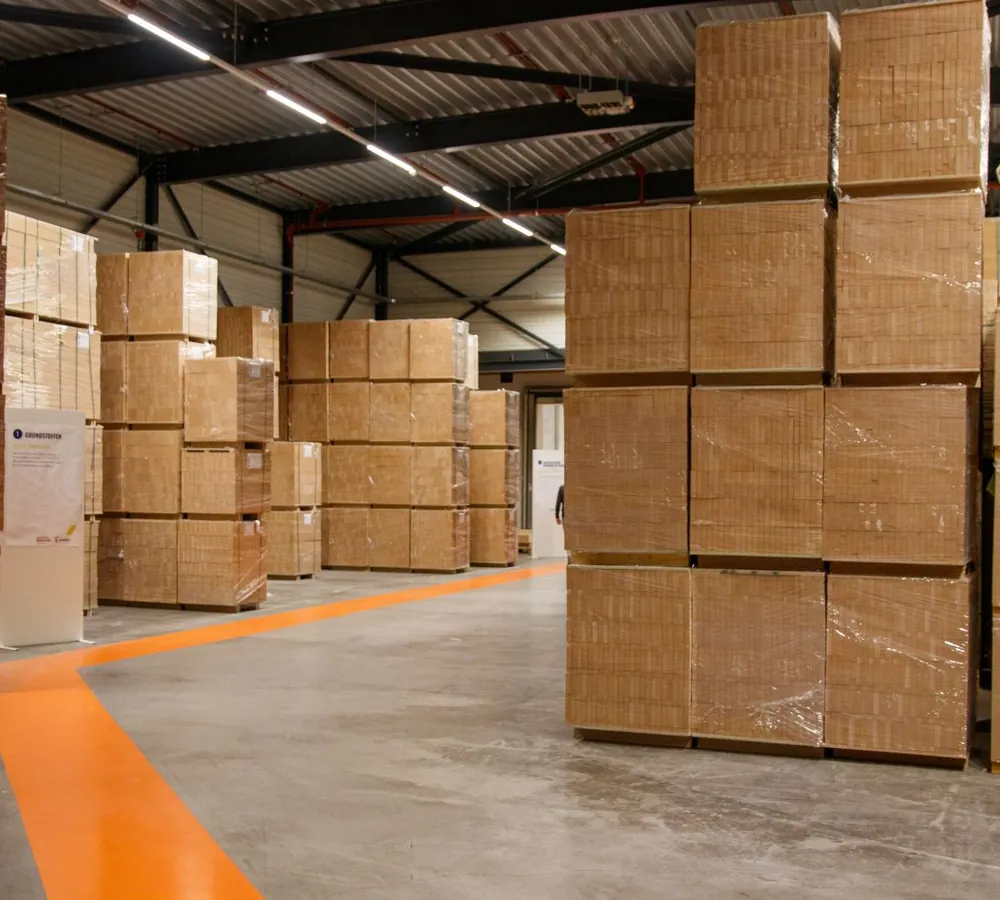 Packed cartons on pallets inside a warehouse
